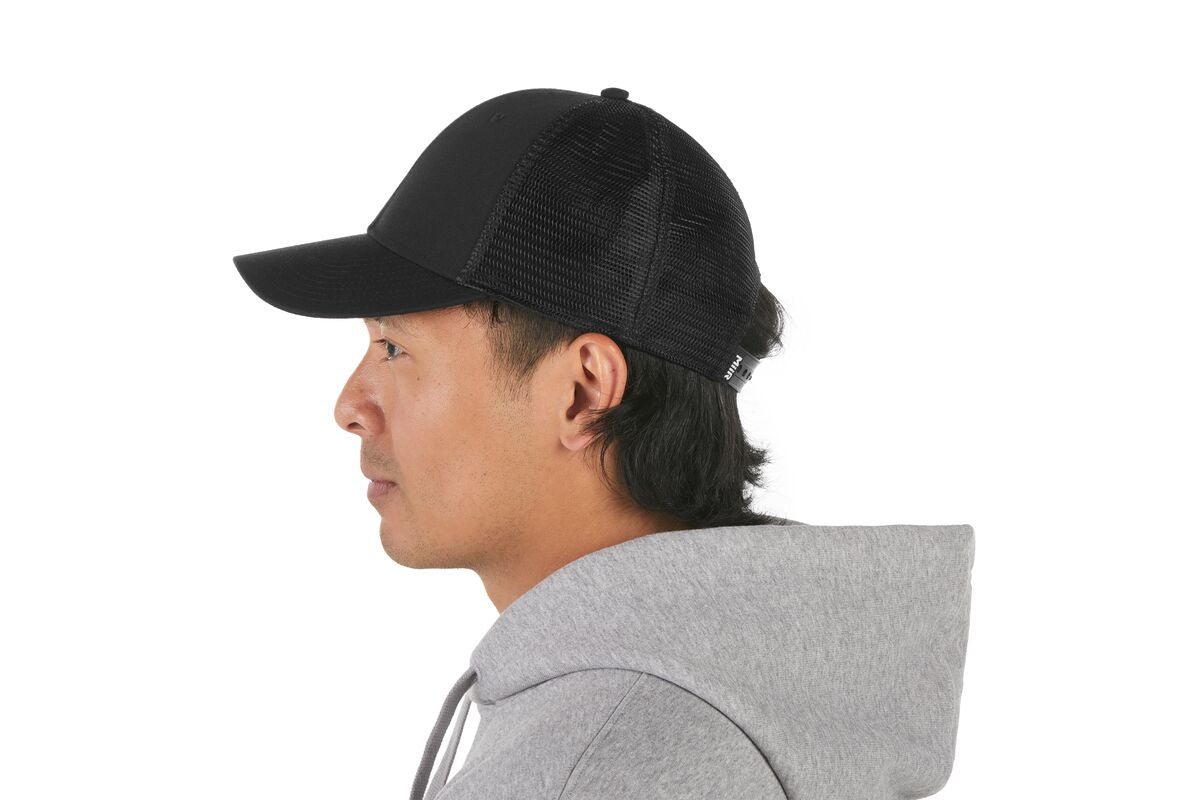 recycled-poly-low-profile-trucker-hat-z8 WebPDP-HAT002002_Recycled_Poly_Low_Profile_Trucker_Hat_Black_Studio_Harper_Studios_0723_Back__HAT002002OS.jpg