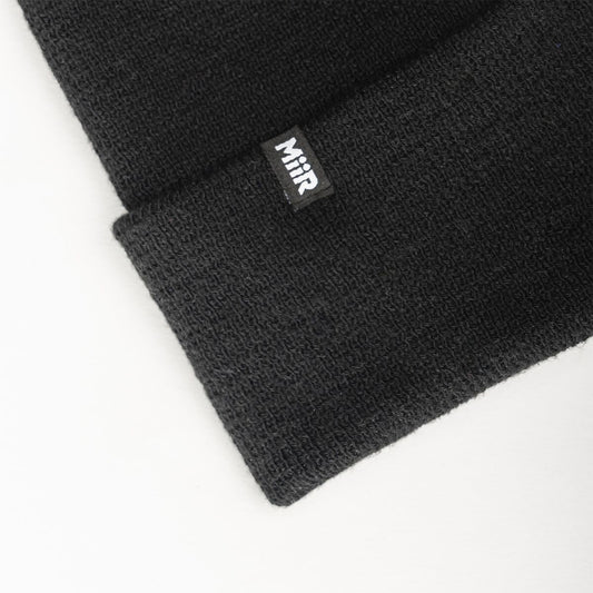 recycled-poly-fine-knit-beanie-k8 WebPDP-RecycledPolyFineKnitBeanie_Studio_TagDetail_Black__BNE005002OS.jpg